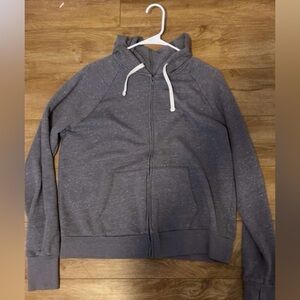Gray zip up with white drawstrings